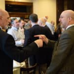 2 professionals networking at Maggiano's Little Italy during the June 2018 Lunch and Learn event